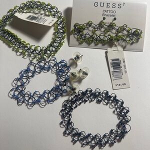 Four Guess Tattoo Bracelets and matching post earrings.